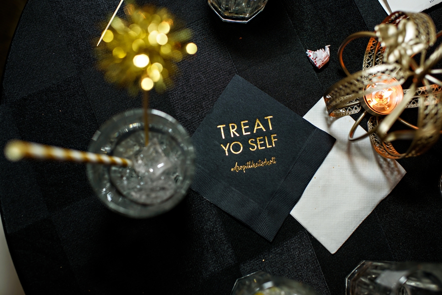 A wedding detail of the napkins that say Treat yo self.